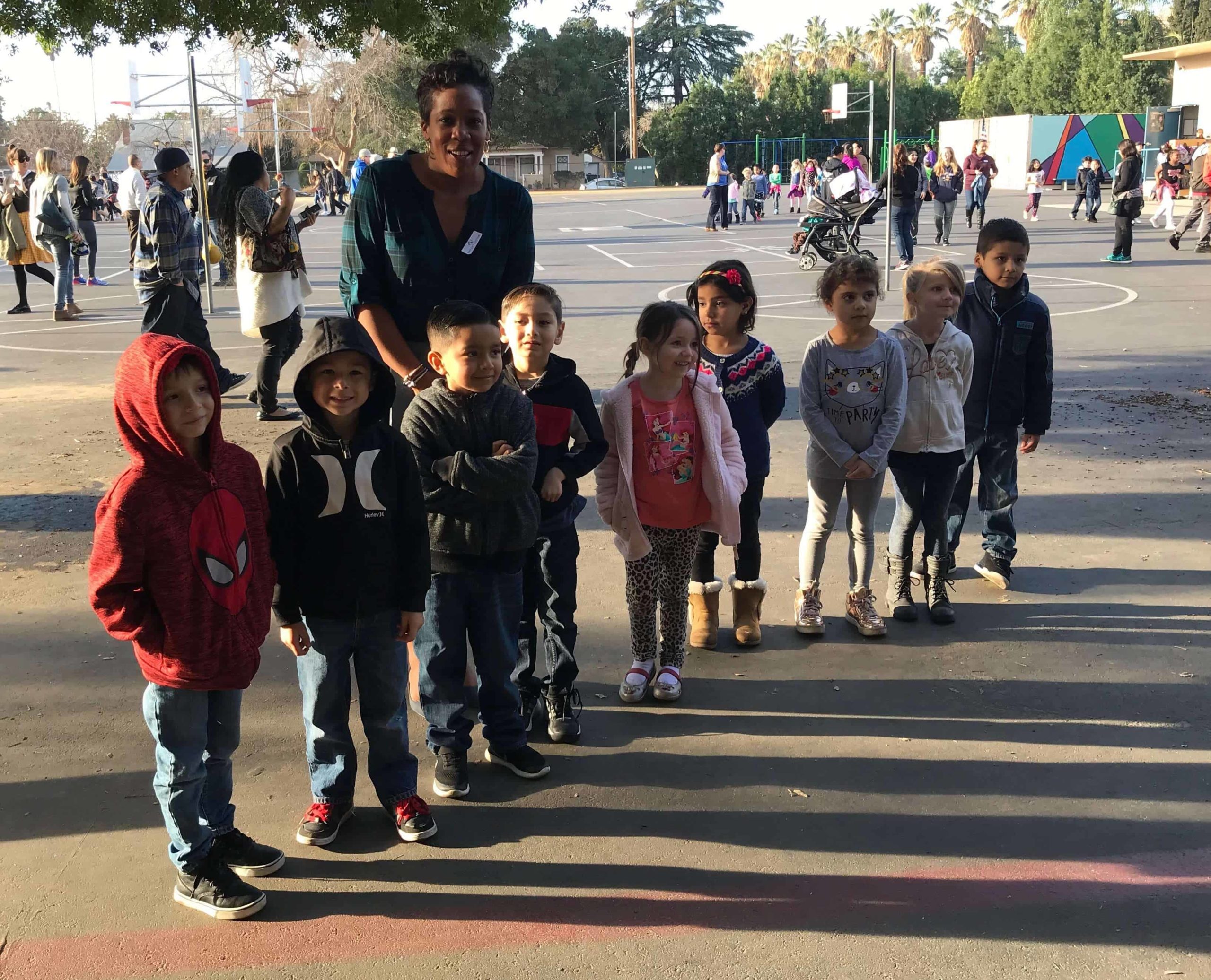 Rachel Etienne of Student Achievement Partners accompanied us on the tour. Here she is pictured with some kindergarteners after the Friday morning assembly.