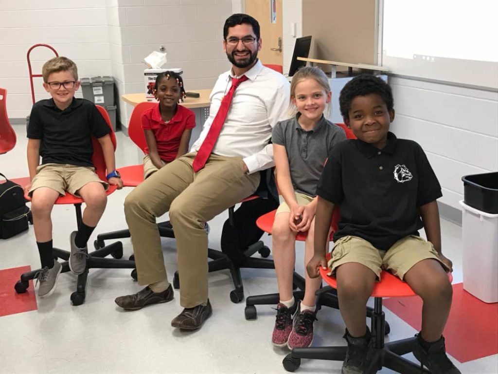 Silas Kulkarni, The Teaching Lab, interviews first and second graders at Laurel Elementary.